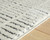 Turinwith - 5' x 7' Rug - Ivory / Black