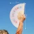 Hand fan "hotter than last summer"