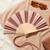 Hand fan brown and beige stripes