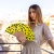 Hand fan yellow dots