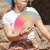 Hand fan pink and green gradient