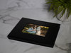 A popular and affordable option is our 7 inch original video book in luxurious black with ultra-soft touch material. It makes addition to any coffee table, countertop, entryway, foyer, or library.
