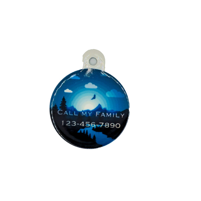 Moon Rising mountain scene personalized pet ID tag. Breathtaking shades of blue and black, showcasing a picturesque mountain panorama with a serene lake, towering pine trees, and an eagle soaring against the rising moon.