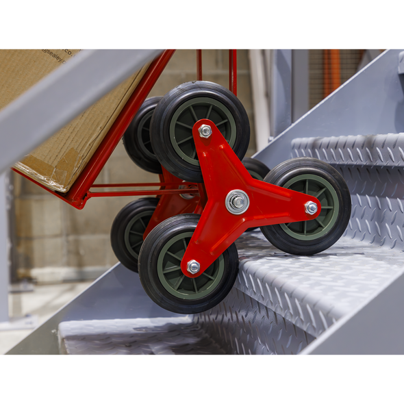 CST985.V3_ACT_WHEELS_ON_STRAIRS