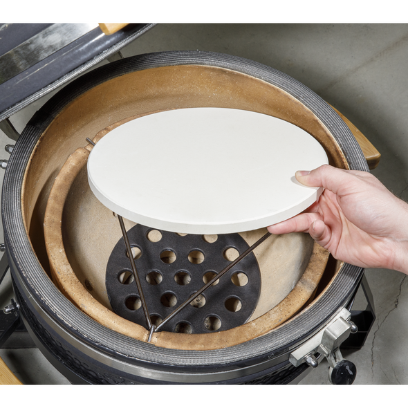 DG187_ACT_PUTTING_ON_HEAT_STONE