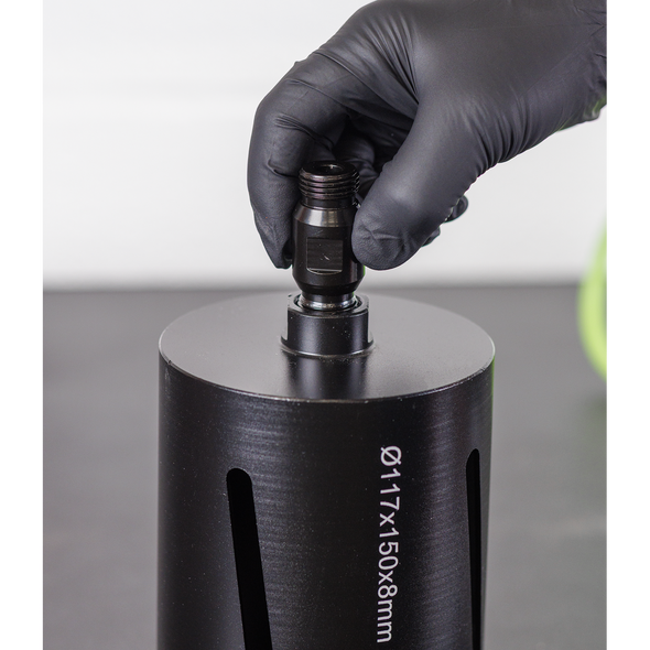 DCD01_ACT_SCREWING_INTO_CORE_DRILL