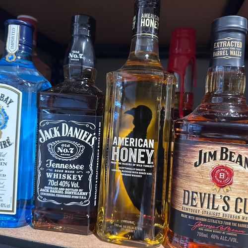 Bottle of Spirts Jack Daniels, Chivas Regal, Saphire Gin, and devils cut jim beam.