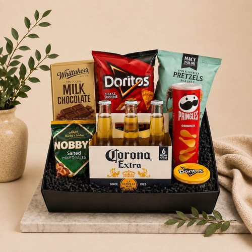 Beer Lover’s Hamper with a six-pack of Corona, snacks, chocolates, and a gift card, wrapped in cellophane with ribbons for delivery to Naracoorte.