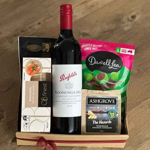 Cheese & Wine Gift Box with selected cheese, OB’s Finest crackers, Darrell Lea BB’s Mint, and 700 ml wine, wrapped with ribbons
