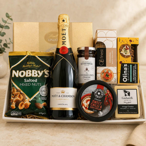 Moët Celebration & Gourmet Gift Tray with 750ml Moët, Lindt chocolate, Nobby’s mixed nuts, cheddar cheese, Beerenberg onion chutney, OB’s wafer crackers, Olinas sunflower & cranberry crackers, and Deli Rock Dip