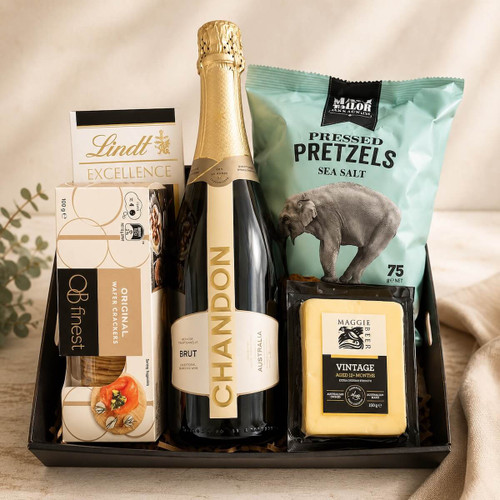 Chandon & Savoury Chocolate Gift Tray with 750ml Chandon Brut, Macy & Tailor flat pretzels, OB’s finest crackers, cheddar cheese, and Lindt chocolate block