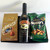 Bottle of 700 ml Baileys with Lindt assorted chocolates and Nobbys mixed nuts.
