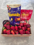 Strawberries dipping sauce chocolates and lollies