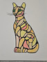 hand drawn sketch of a Callico cat in orange black and yellow colours.