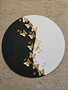 Art work in black and white with gold butterflys.