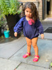 Girls Infant Royal Blue Eyelet Bubble Romper with Pink Bow - side view - Sophie Catalou