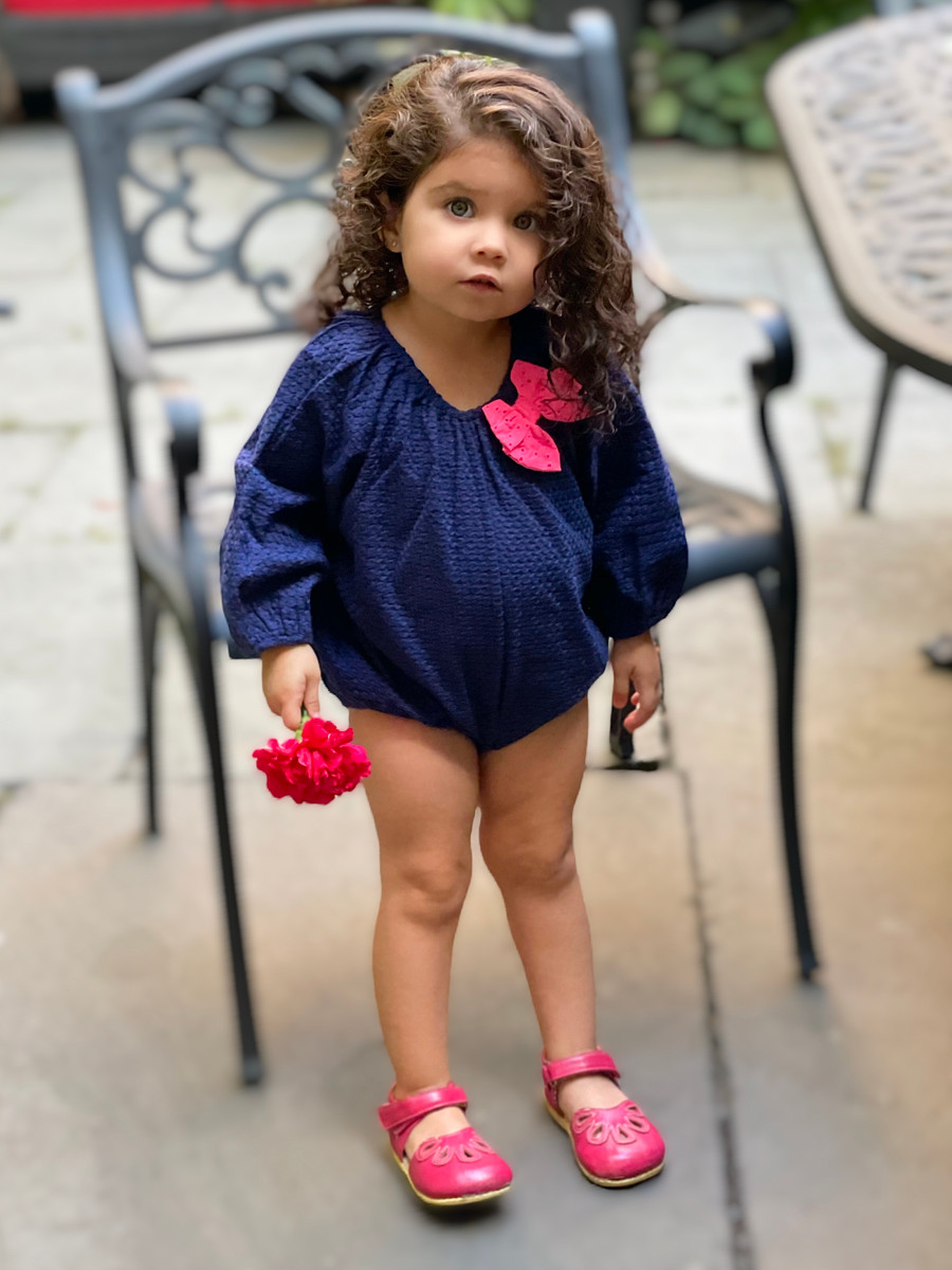 Girls Infant Royal Blue Eyelet Bubble Romper with Pink Bow - front view - Sophie Catalou