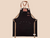 Handmade black cross-back apron with genuine leather straps, brass hardware, and utility pockets