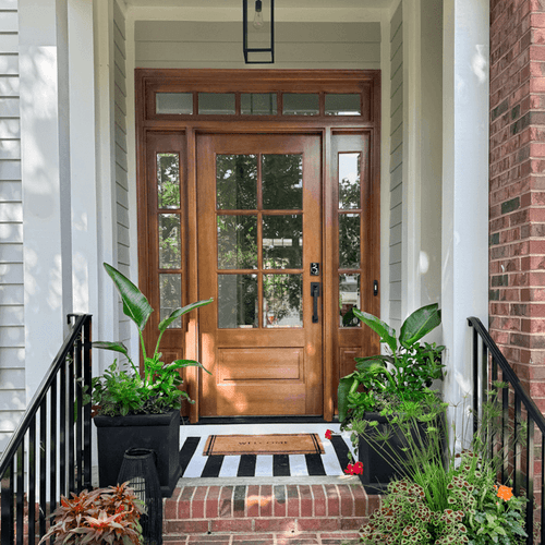 Mahogany 6 Lite single front entry door with sidelights and transom featuring clear bevel glass for elegance and balance. Available at GrandEntryDoors.com.