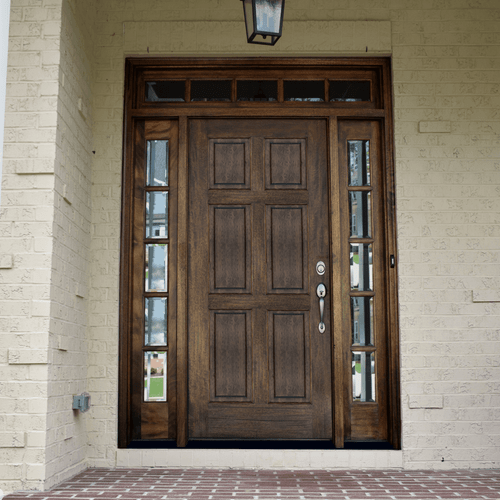 Elegant 6 panel Colonial African Mahogany entry door with sidelights and transom featuring clear bevel glass. Available at Grandentrydoors.com.