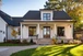 Traditional 4 Lite mahogany double entry door offering balance, symmetry, and natural light. Available at GrandEntryDoors.com.