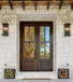 Beautiful mahogany double door with 4 Lite True Divided Lite construction and clear glass. Available at GrandEntryDoors.com.