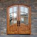 Grand Entry Doors Nantahala 6 Lite Knotty Alder Arch-Top Double Entry Door | Wood Species: Knotty Alder, Glass (as pictured): Clear Bevel | Pictured Finished / Stained. All wooden front doors are priced and delivered as unfinished / not stained pre-hung units. No finish options available for shipped units. Grand Entry Doors Nantahala 6 Lite Knotty Alder Arch-Top Double Entry Door | Wood Species: Knotty Alder, Glass (as pictured): Clear Bevel | Pictured Finished / Stained. All wooden front doors are priced and delivered as unfinished / not stained pre-hung units. No finish options available for shipped units.