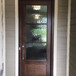 Grand Entry Doors Andalucia 3-Lite 1W3H True Divided Lite Single Entry Door | Wood Type: African Mahogany | Pictured Finished / Stained. All wooden front doors are priced and delivered as unfinished / not stained pre-hung units. No finish options available for shipped units. Grand Entry Doors Andalucia 3-Lite 1W3H True Divided Lite Single Entry Door | Wood Type: African Mahogany | Pictured Finished / Stained. All wooden front doors are priced and delivered as unfinished / not stained pre-hung units. No finish options available for shipped units.