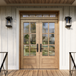 Elegant 6 Lite mahogany double front door with matching 5 Lite transom and clear bevel glass that enhances curb appeal. Available at GrandEntryDoors.com.