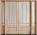 Mahogany 9 Lite prairie style double front door with sidelights featuring clear bevel glass for timeless beauty and inviting brightness. Available at GrandEntryDoors.com.
