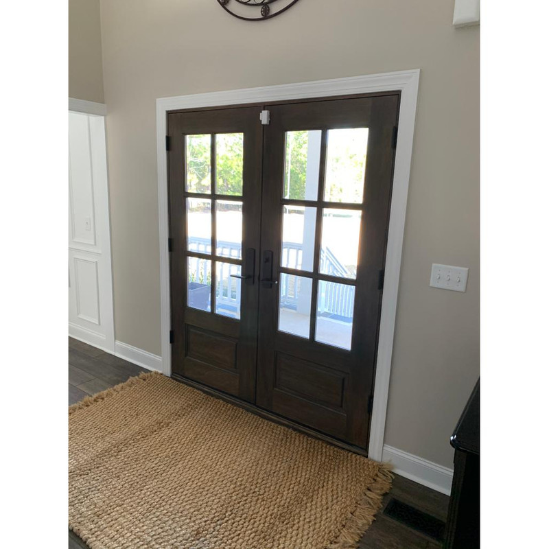 6 Lite mahogany double front door that combines strength, durability, and timeless sophistication. Available at GrandEntryDoors.com.