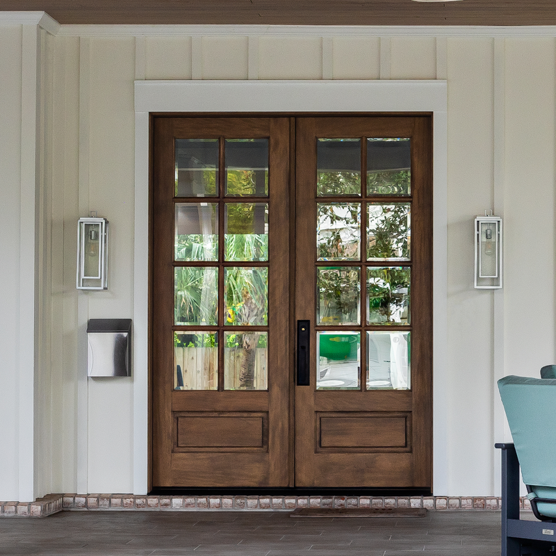 Grand Entry Doors Andalucia 8-Lite True Divided Lite Double Entry Door Grand Entry Doors Andalucia 8 Lite Entry Door | Wood Species: Mahogany, Glass (as pictured): Clear Bevel | Pictured Finished / Stained.  All wooden front doors are priced and delivered as unfinished / not stained pre-hung units. No finish options available for shipped units. Photo Credit: Muriel Silva (@murielsilvaphoto)