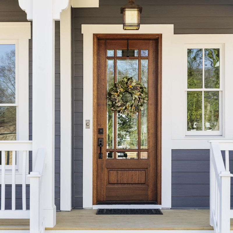 Grand Entry Doors Andalucia 9-Lite Prairie Style True Divided Lite Single Entry Door  | Wood Species: Mahogany, Glass (as pictured): Clear Bevel | Pictured Finished / Stained.  All wooden front doors are priced and delivered as unfinished / not stained pre-hung units. No finish options available for shipped units.