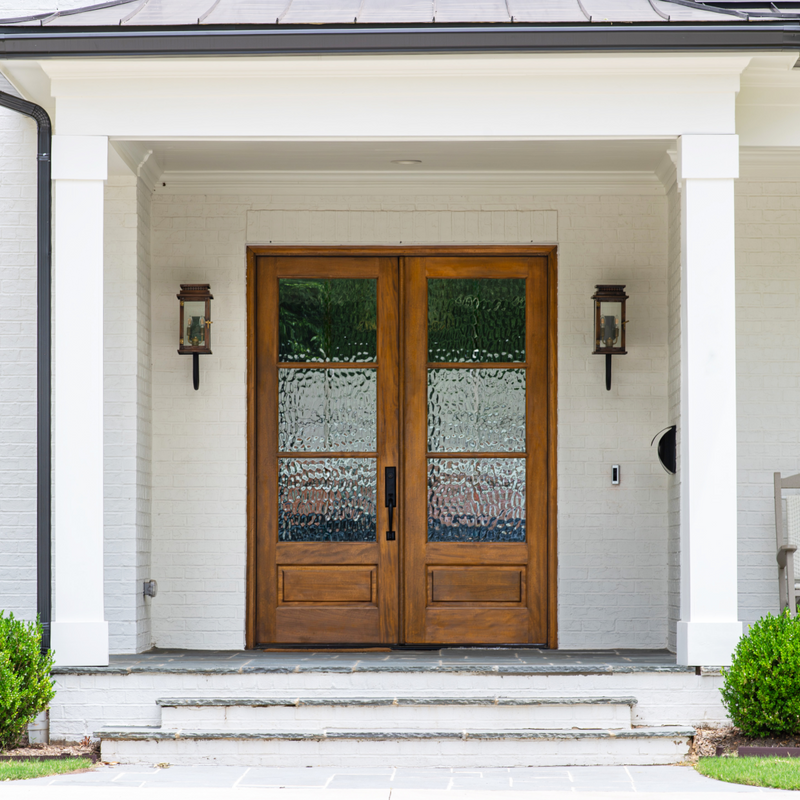 African Mahogany wood double entry door featuring True Divided Lite Low-E glass. Available at GrandEntryDoors.com.