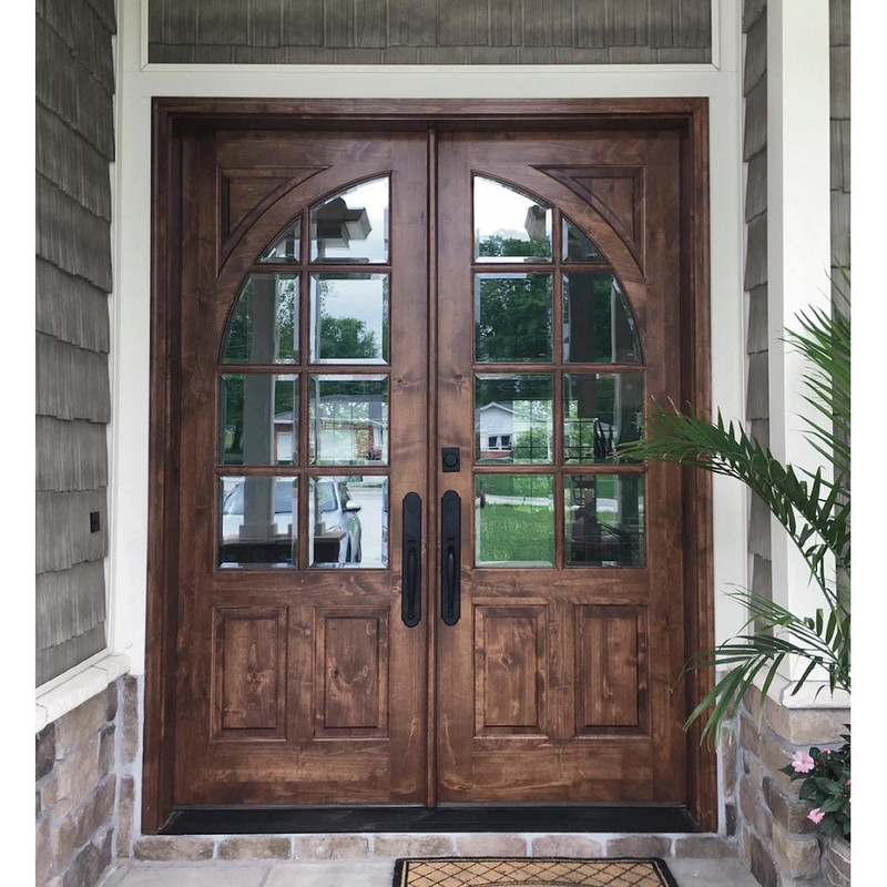 Grand Entry Doors Highlands True Divided Lite Mahogany or Knotty Alder Double Entry Door | Wood Species (as pictured): Knotty Alder, also available in Mahogany, Glass (as pictured): Clear Bevel | Pictured Finished / Stained.  All wooden front doors are priced and delivered as unfinished / not stained pre-hung units. No finish options available for shipped units.