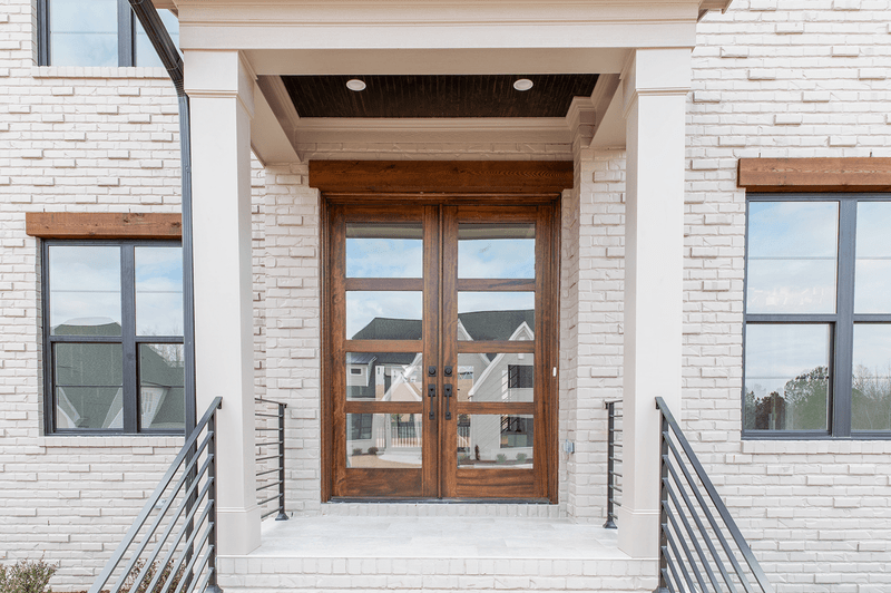 Grand Entry Doors Tacoma 4-Lite Contemporary Mahogany Double Entry Door | Wood Species: Mahogany, Glass (as pictured): Clear Non-Bevel, also available with Frosted | Pictured Finished / Stained. All wooden front doors are priced and delivered as unfinished / not stained pre-hung units. No finish options available for shipped units. Grand Entry Doors Tacoma 4-Lite Contemporary Mahogany Double Entry Door | Wood Species: Mahogany, Glass (as pictured): Clear Non-Bevel, also available with Frosted | Pictured Finished / Stained. All wooden front doors are priced and delivered as unfinished / not stained pre-hung units. No finish options available for shipped units.