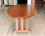 Oval beech table with art deco ends