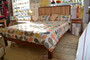 Straight back Jarrah bed with Crazy Ash panel, Queen