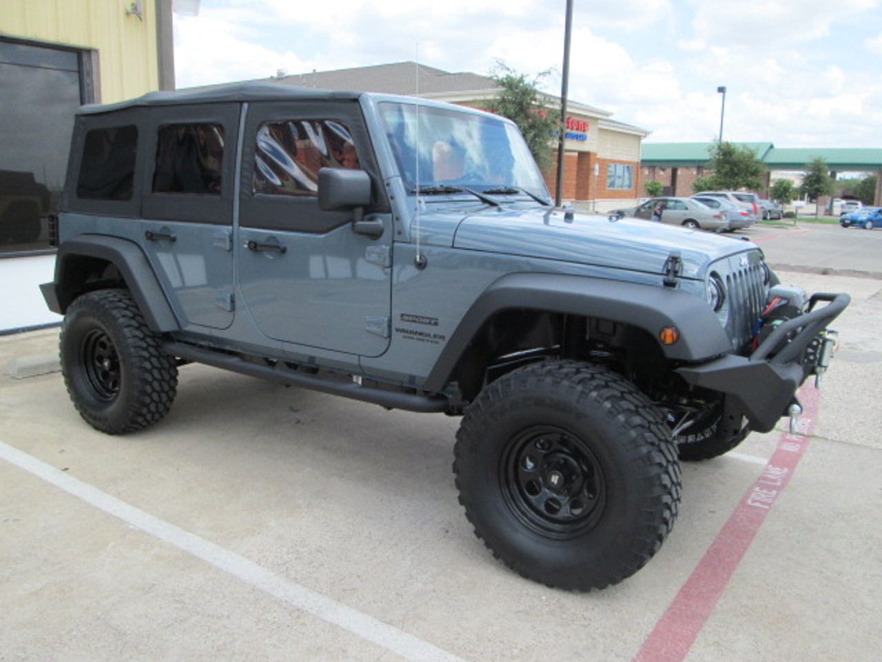 SOLD 2014 Jeep Wrangler Unlimited Sport Stock# 106615