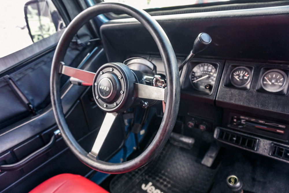 SOLD 1987 Blue Wrangler YJ Stock# 510686 - Collins Bros Jeep