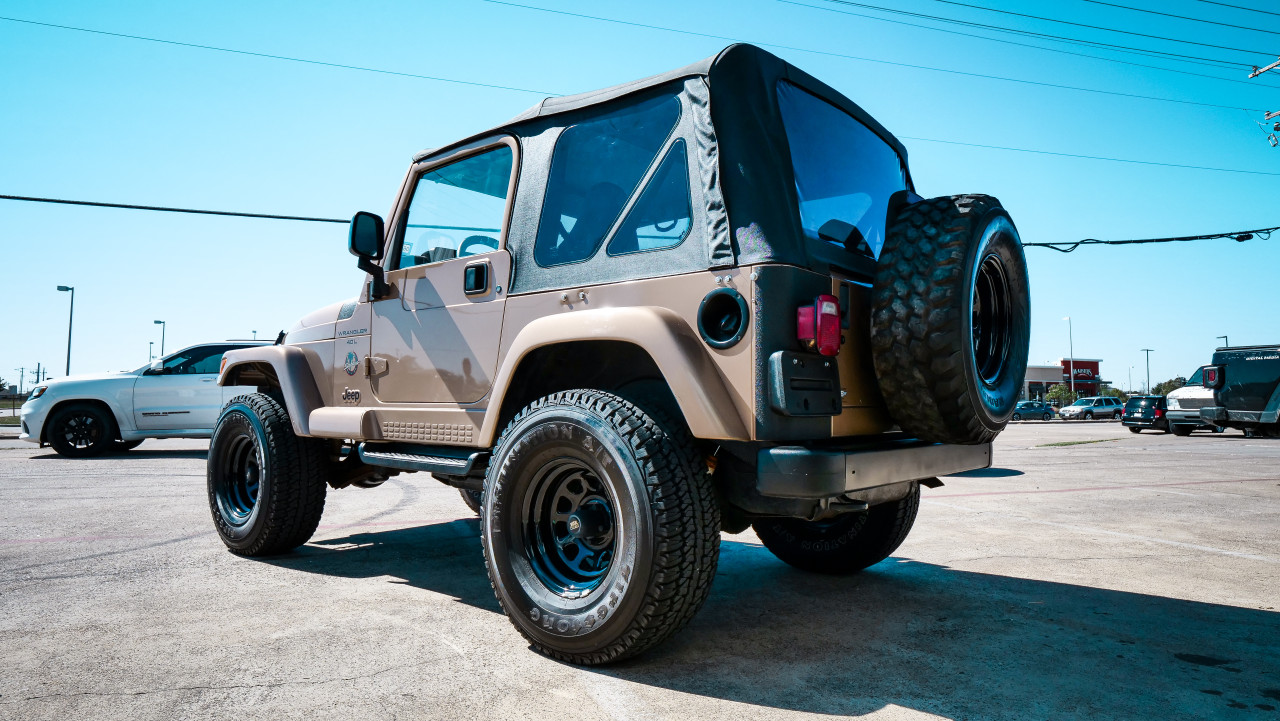 SOLD 1999 Jeep Wrangler TJ Sahara #496438 - Collins Bros Jeep