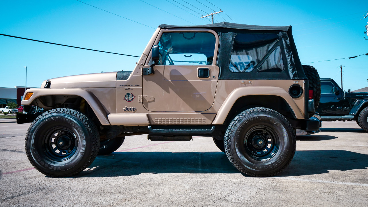 SOLD 1999 Jeep Wrangler TJ Sahara #496438 - Collins Bros Jeep