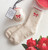 Cozy Socks in Ornament - Blush with Red Bow/Trim