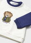 Navy Lion shirt with green pants