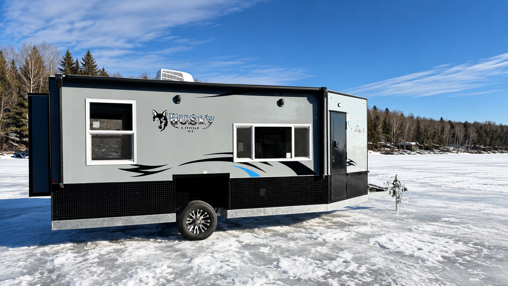 Custom Ice Castle Husky Lodge on a frozen lake in Minnesota winter