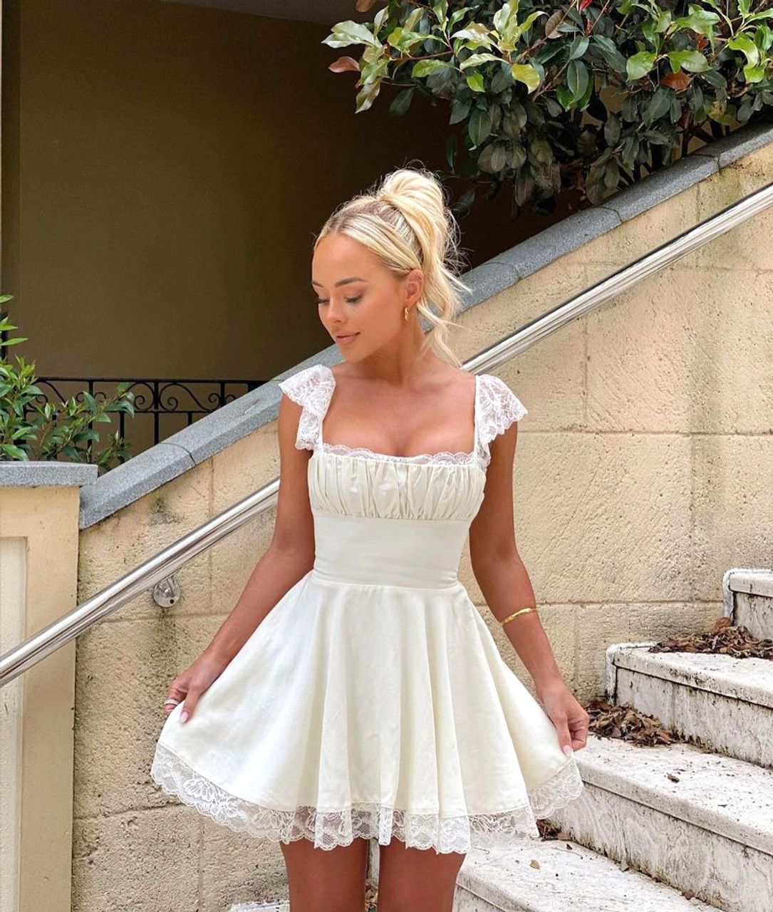 https://cdn11.bigcommerce.com/s-4p4rz5nl/images/stencil/1280x1280/products/9359/153603/Lace_Draped_Corset_Skater_Dress_White__82946.1681509838.jpg?c=2