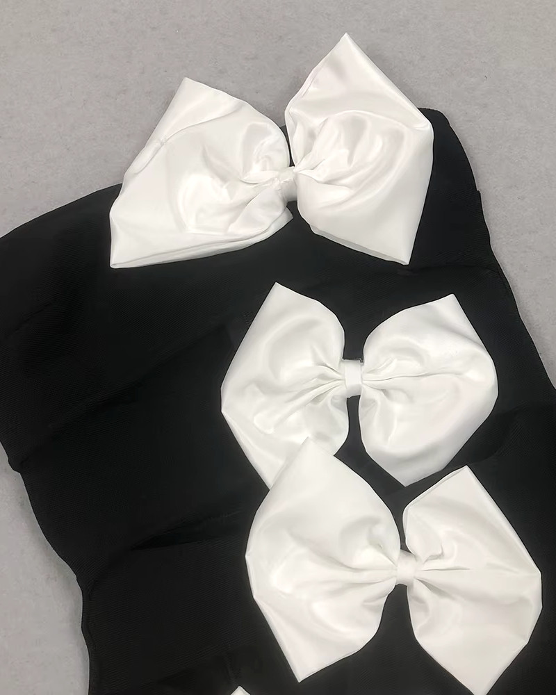 Bestow | Black Open-Back Maxi Dress With Oversized White Bow