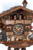 Hones | 86245t | 13''H | Dog & Woodsman | Chalet style | cuckoo clock | close up Hones | 86245t | 13''H | Dog & Woodsman | Chalet style | cuckoo clock | close up