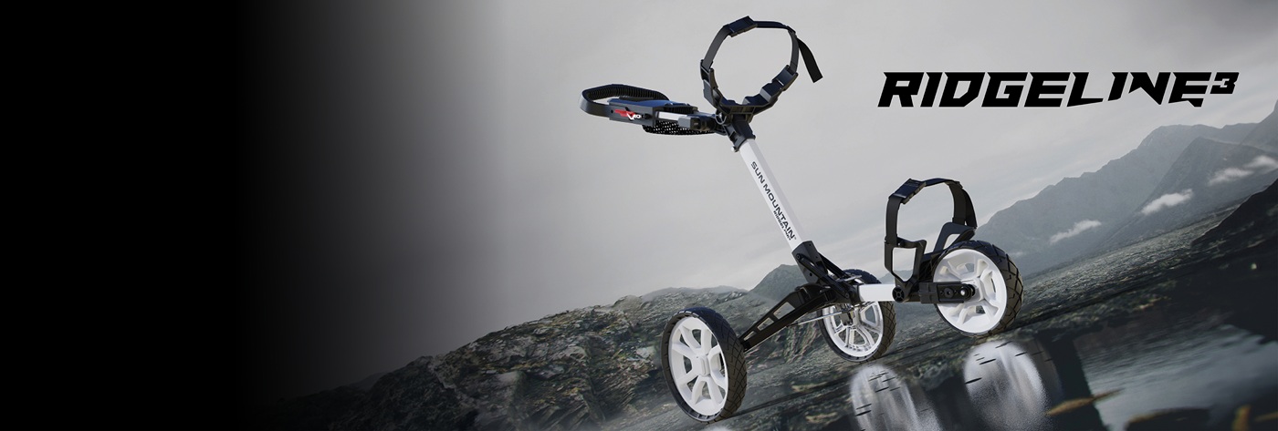 Sun Mountain Ridgeline3 golf trolley displayed against a dramatic mountain landscape background. The three-wheeled black trolley is shown at an angle that highlights its sleek design, white wheels, and adjustable brackets. The Ridgeline3 logo appears in b