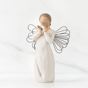 Small faceless angel girl wearing white dress, wire wings, and holding silver star